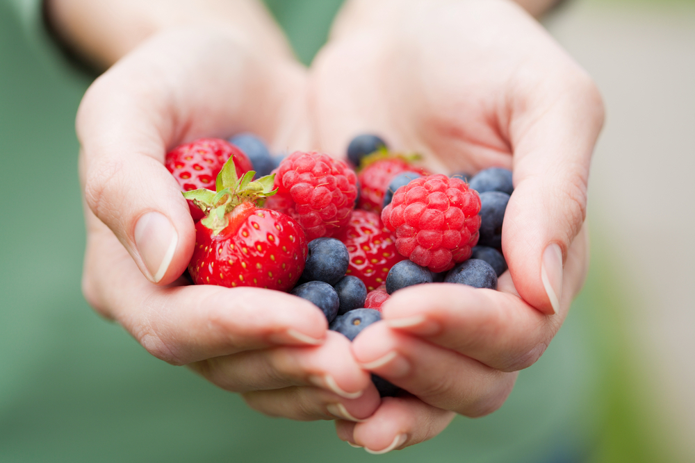 Hands,Holding,Fresh,Berries