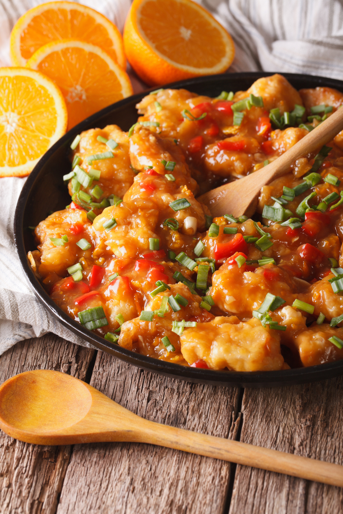 Tasty,Orange,Chicken,Closeup,On,A,Plate,On,The,Table.