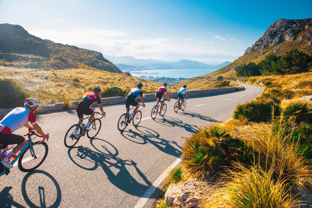 Group,Of,Cyclist,Ride,Together,On,Road,Bicycles,In,Beautiful