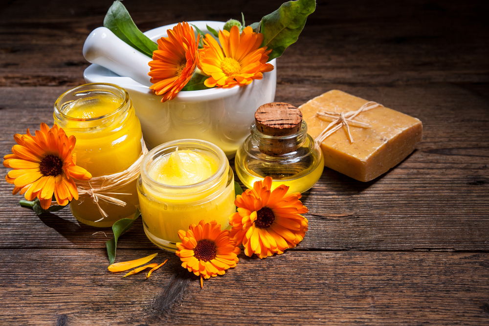 Homemade,Calendula,Ointment,,Soap,And,Oil,On,Wooden,Table