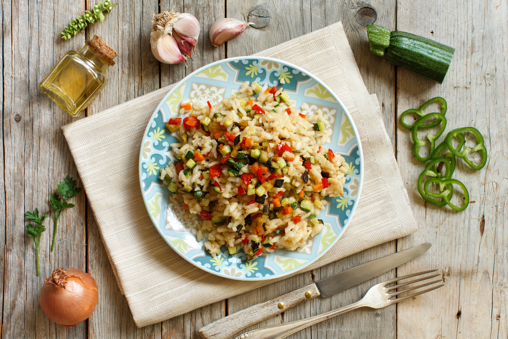 Risotto,With,Vegetables,On,A,Wooden,Table,Top,View