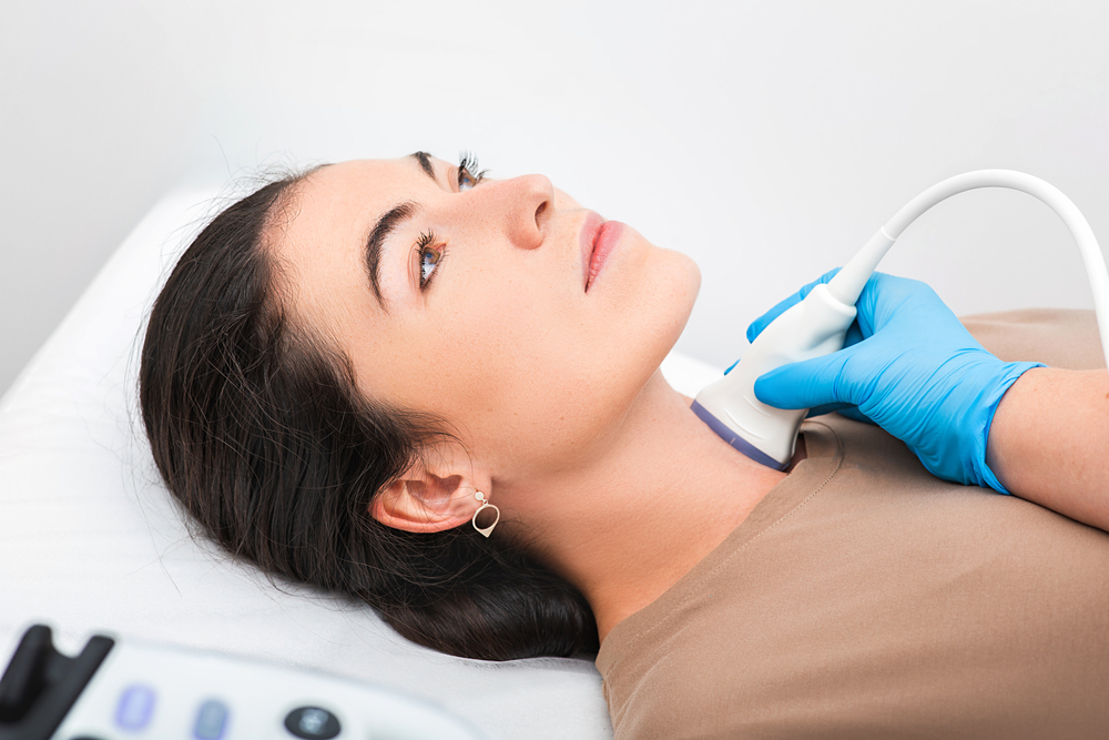 Woman,Patient,Receives,Thyroid,Diagnostics.,Treatment,Of,Thyrotoxicosis,,And,Hypothyroidism.