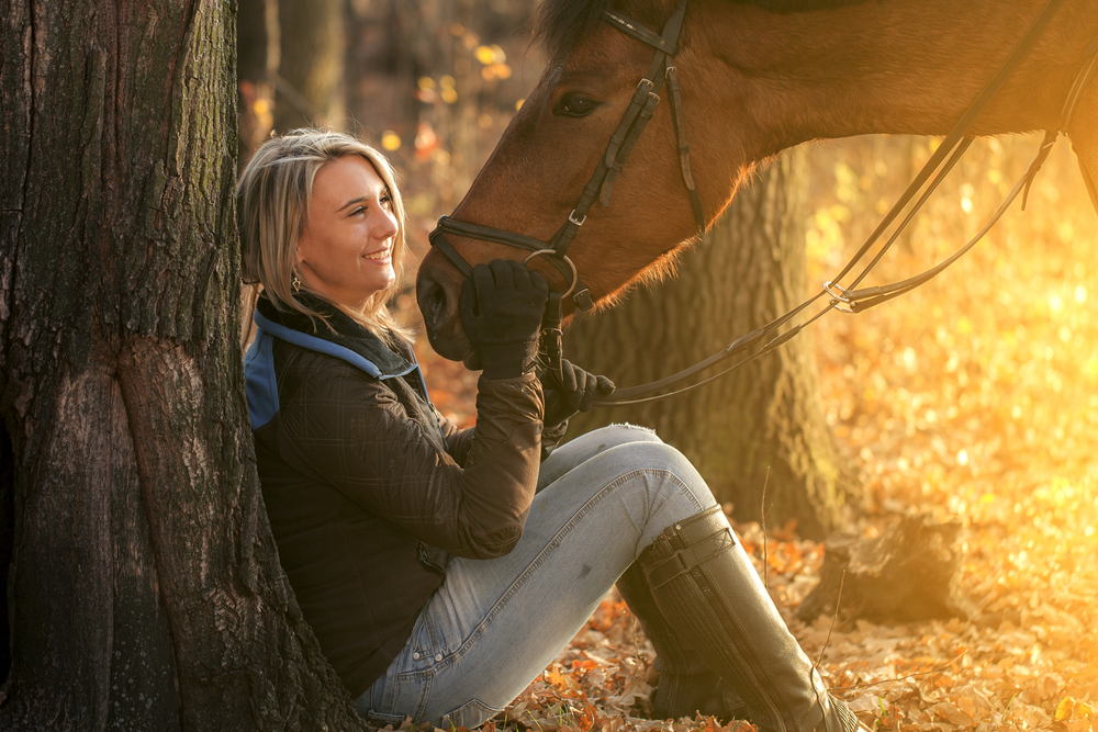 Young,Beautiful,Girl,With,Horse,In,Autumn,Sunset