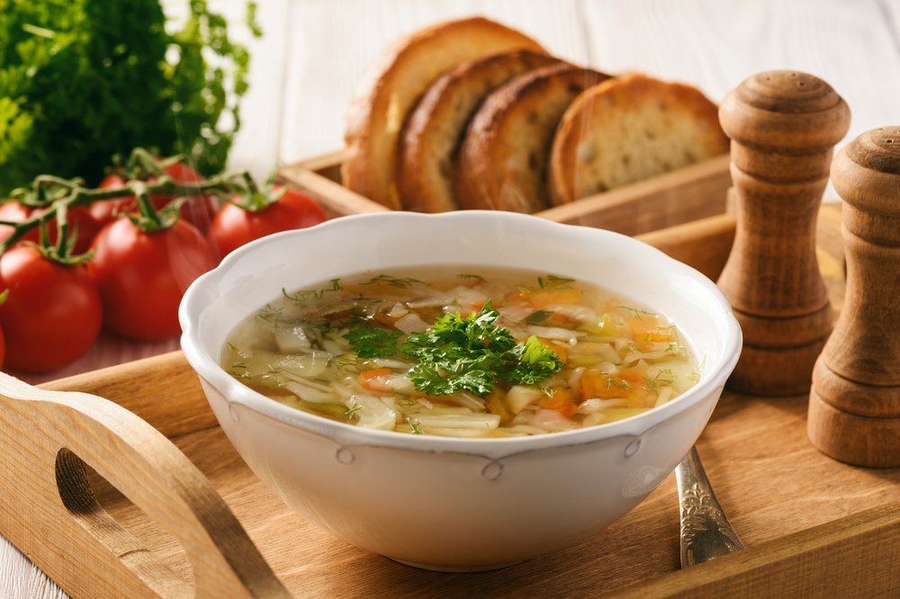 Vegetable,Soup,With,Bread,On,Wooden,Tray.