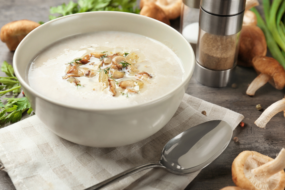 Bowl,Of,Creamy,Shiitake,Mushroom,Soup,On,Table