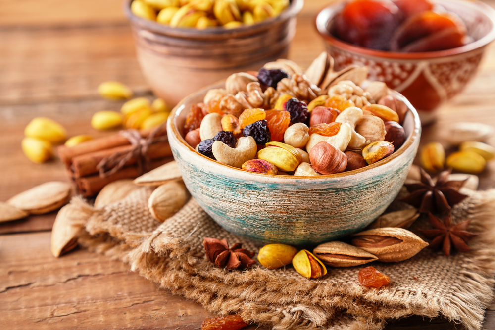 Mix,Of,Nuts,And,Dried,Fruits,On,A,Old,Rustic