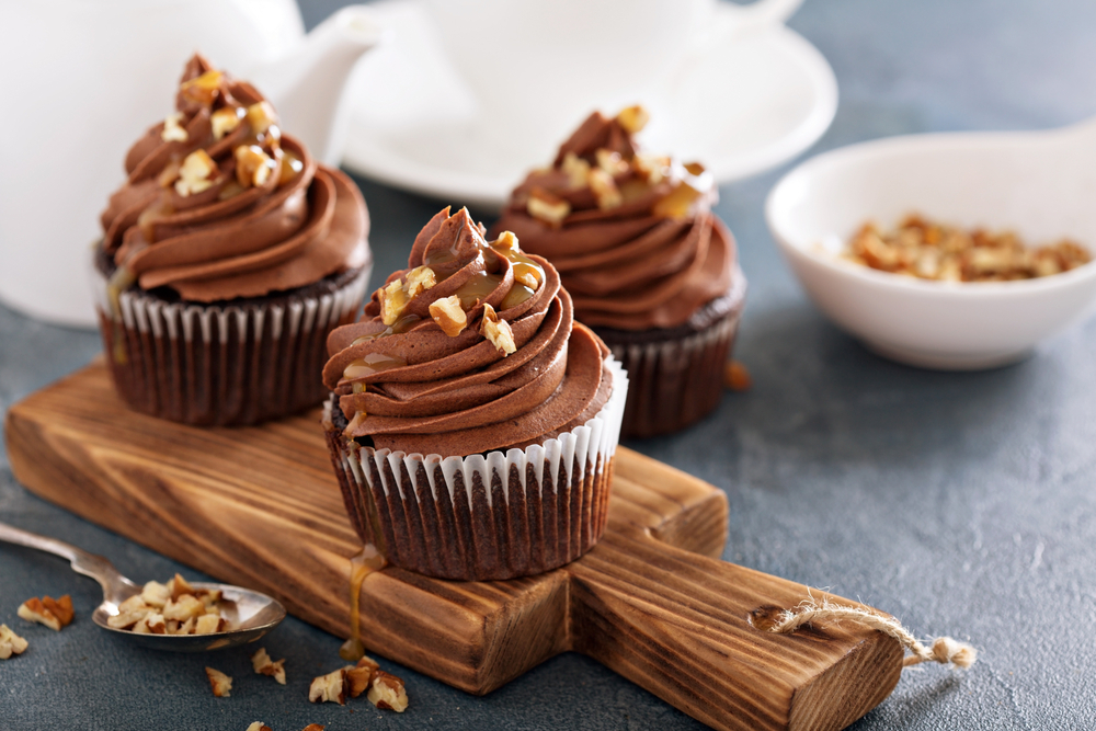 Chocolate,Caramel,Cupcake,With,Nuts,And,Butterscotch,Syrup