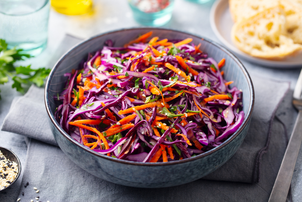 Red,Cabbage,Salad,,Coleslaw,In,A,Bowl.,Grey,Background.,Close