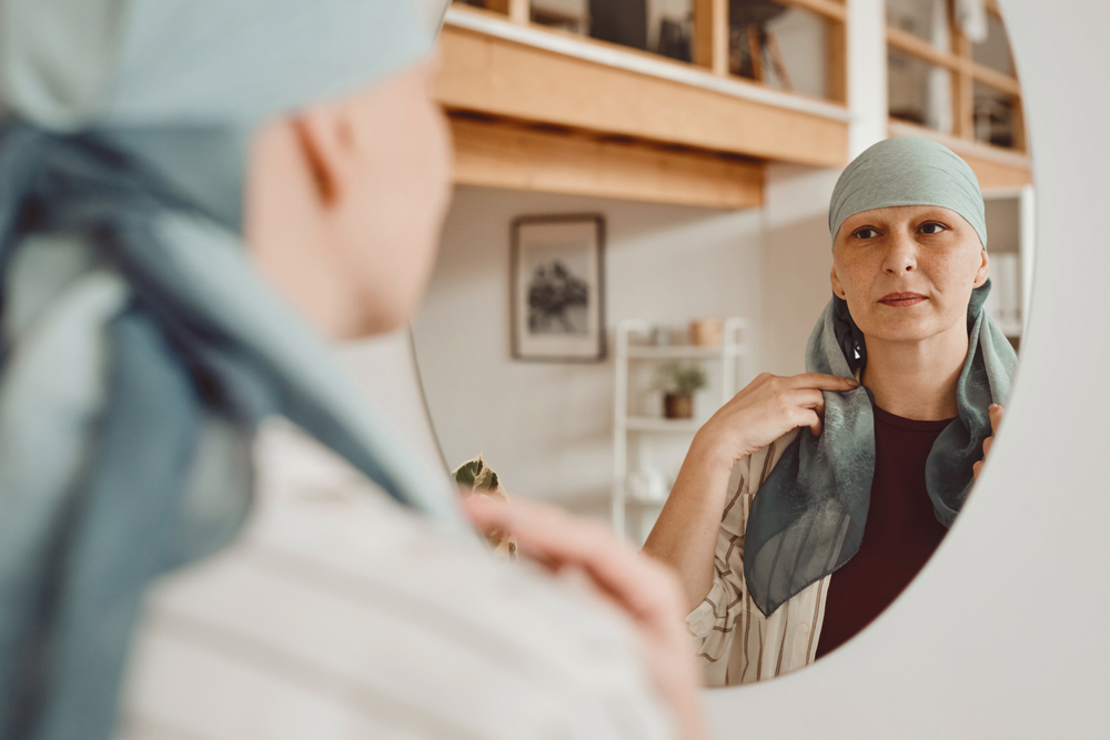 Warm-toned,Portrait,Of,Modern,Bald,Woman,Putting,On,Head,Scarf