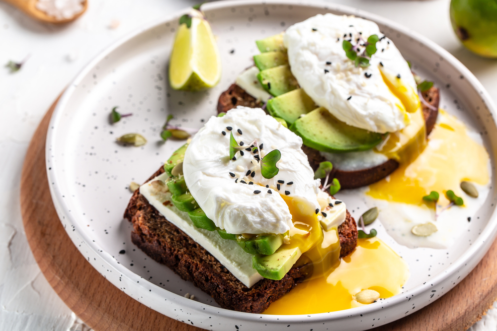 Sandwich,With,Avocado,And,Poached,Egg.,Wholemeal,Bread,Toast,Sliced
