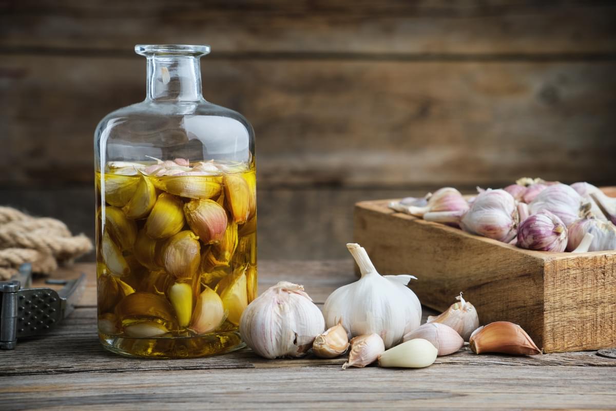 Garlic,Aromatic,Flavored,Oil,Or,Infusion,Bottle,,Wooden,Crate,Of