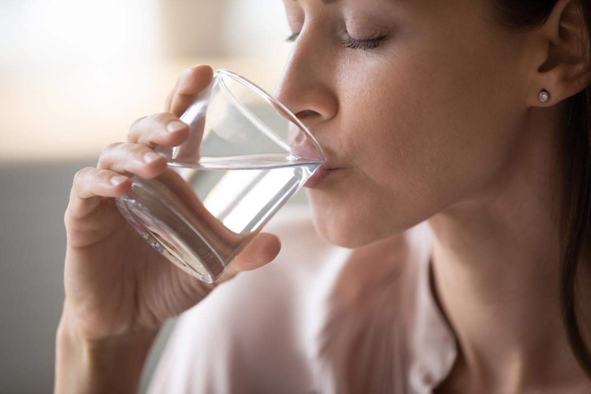 Side,View,Head,Shot,Close,Up,Young,Woman,Drinking,Pure