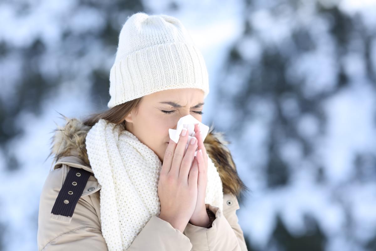 Woman,Blowing,In,A,Tissue,In,A,Cold,Winter,With
